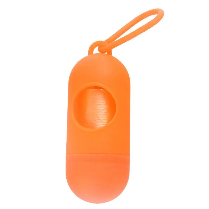 Compact black dog waste bag dispenser holder with metal hook and Velcro strap.