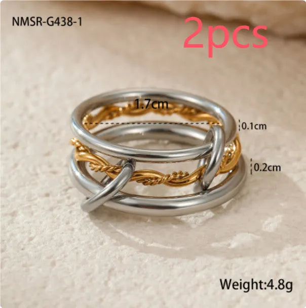 Stacked stainless steel rings with 18K gold plating in colour matching design