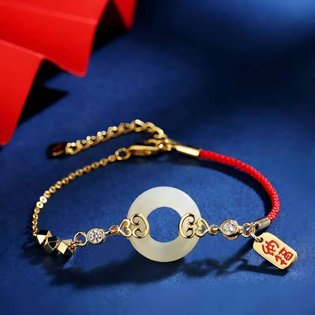 Hetian jade gourd bracelet set in 925 sterling silver with peace buckle and Fu character motifs on white background