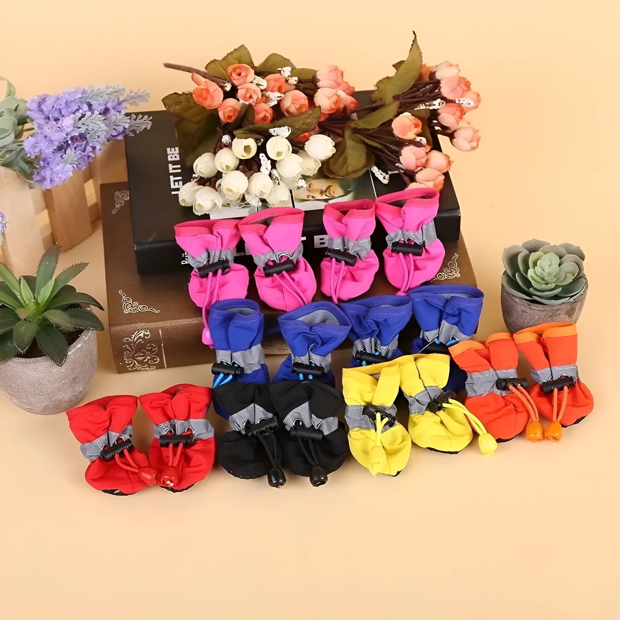 Pet dog four seasons breathable soft bottom dog shoes in multiple colours on a white background