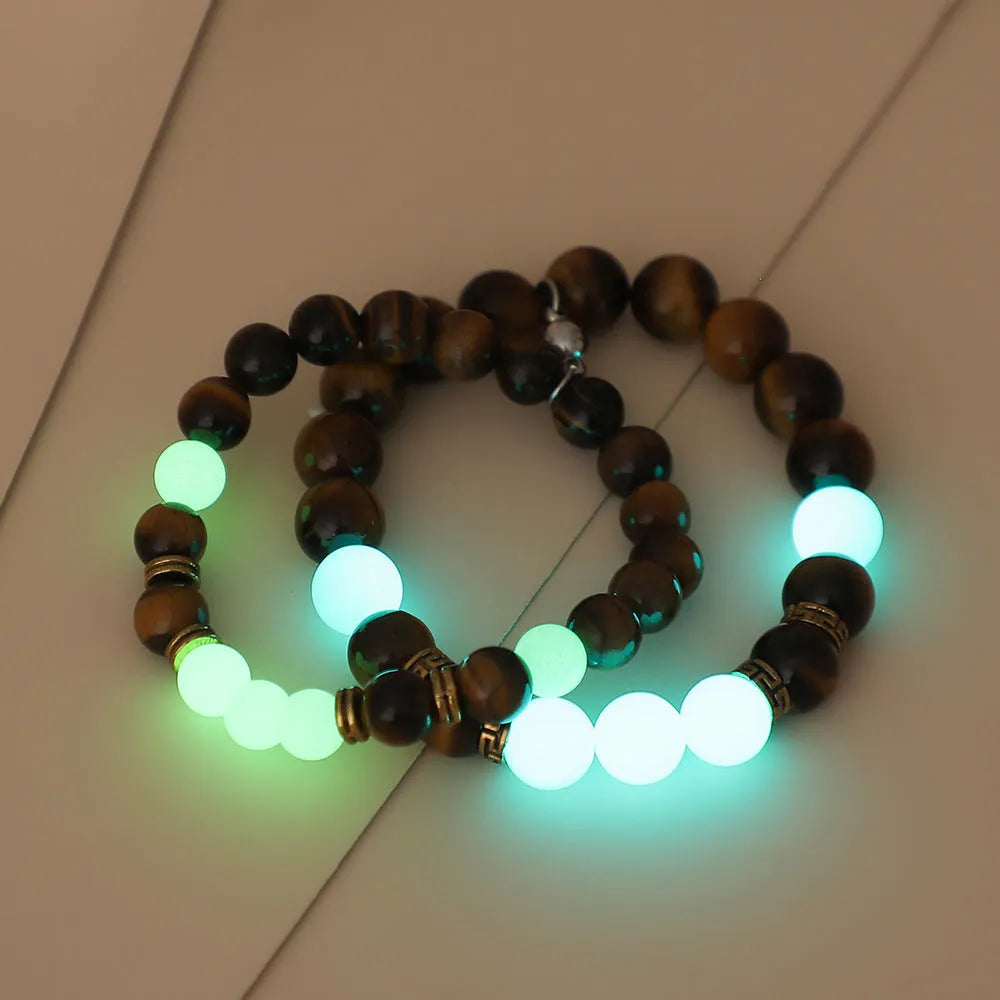 Pair of amber Y552 geometric luminous couple bracelets with patterned surface