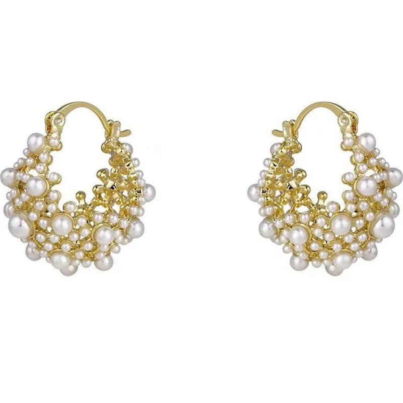 Gold copper drop earrings with small rice-shaped pearl inlay in a flower basket shape for women