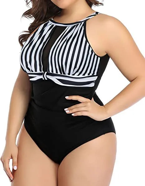 Women's black, striped, and red floral one-piece swimsuit in extended sizes L to 4XL.