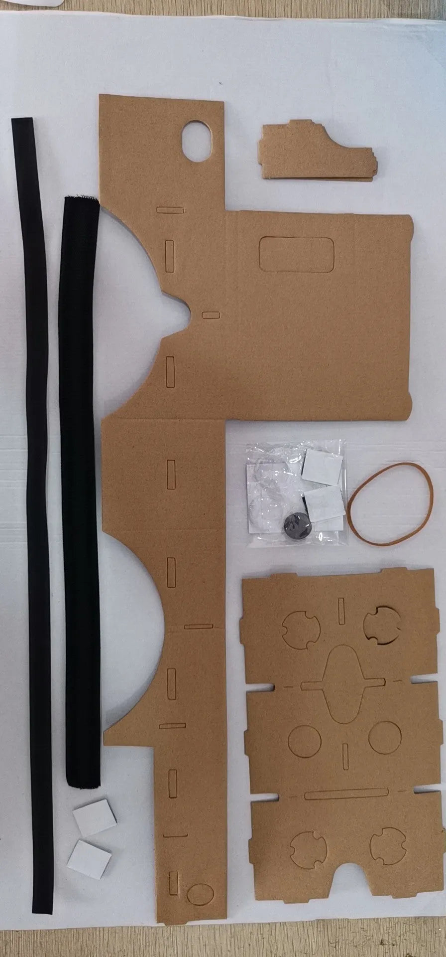 Pink and white VR cardboard glasses for 6-inch phones with adjustable head strap.