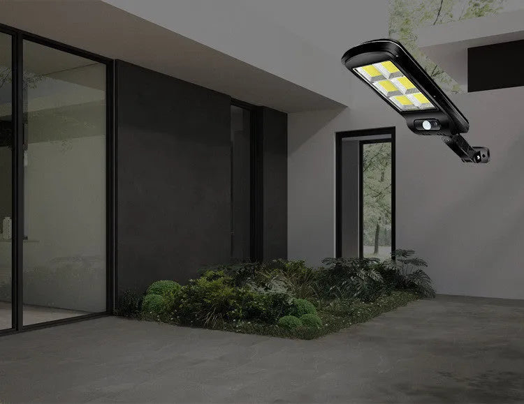 Black solar powered outdoor light with motion sensor and IP65 waterproof rating