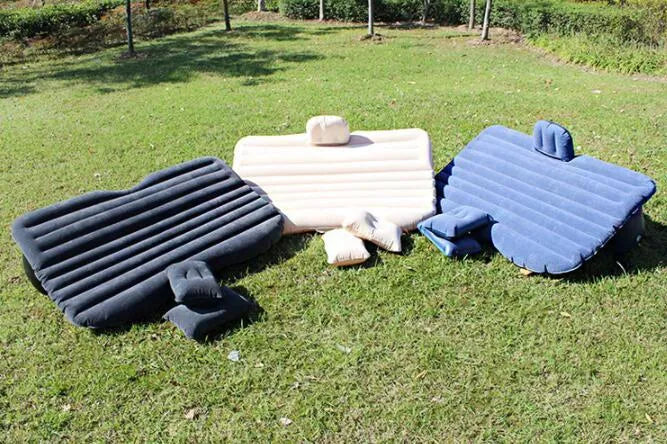 Car inflatable bed with 0.5mm flocking cloth in black wave, including pillows and pump, set up in a car rear seat