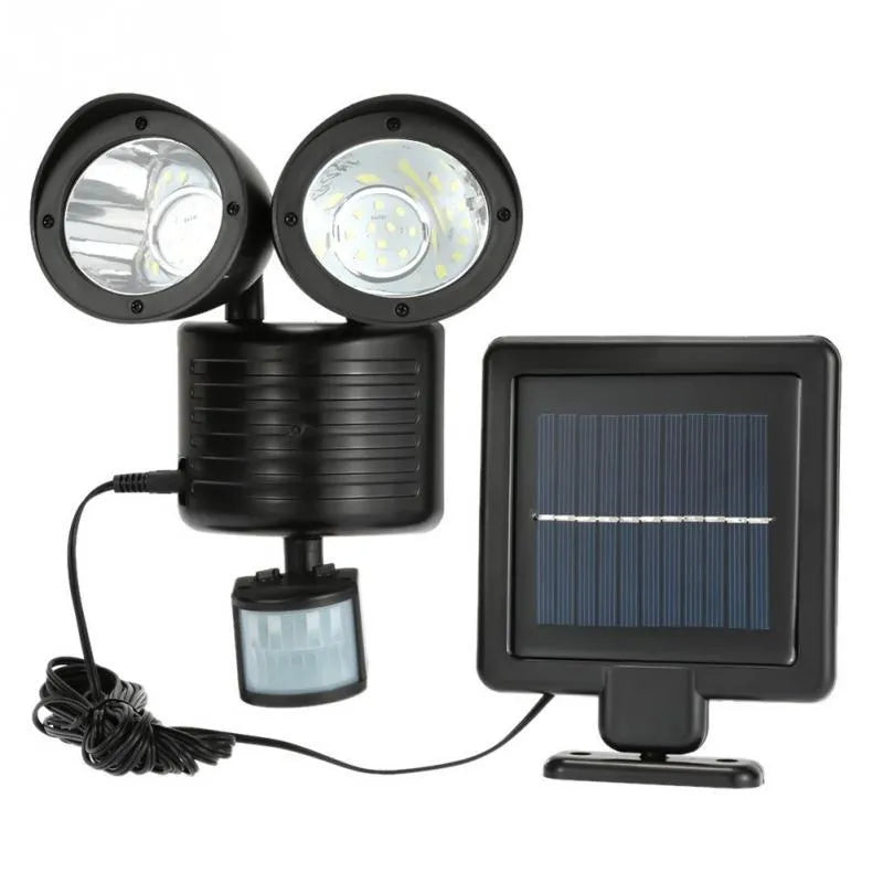 Double head solar induction spotlight in black mounted on a wall with motion sensor and LED light