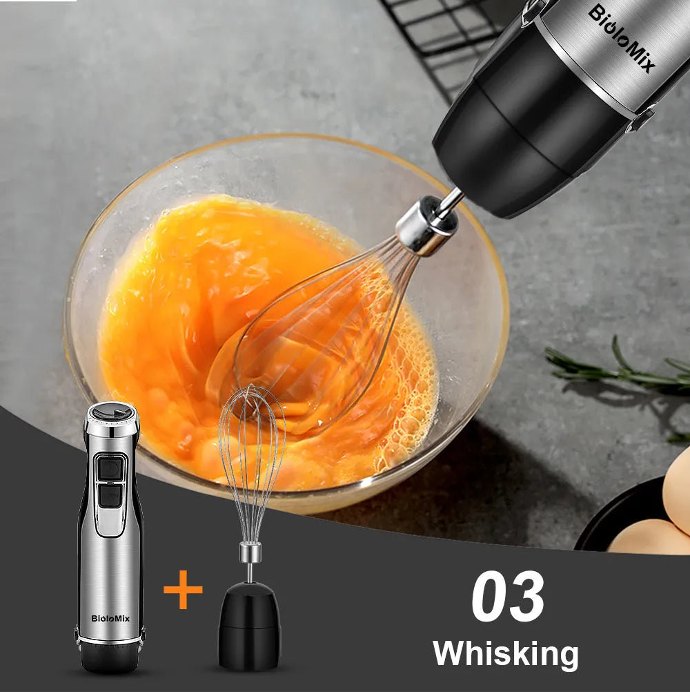 Biolomix silver 4-in-1 hand held immersion blender with stainless steel shaft and whisk on a kitchen counter