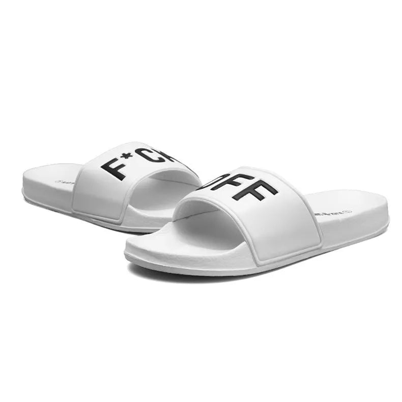 Men's black open-toe slippers with a rubber sole, shown from the side.