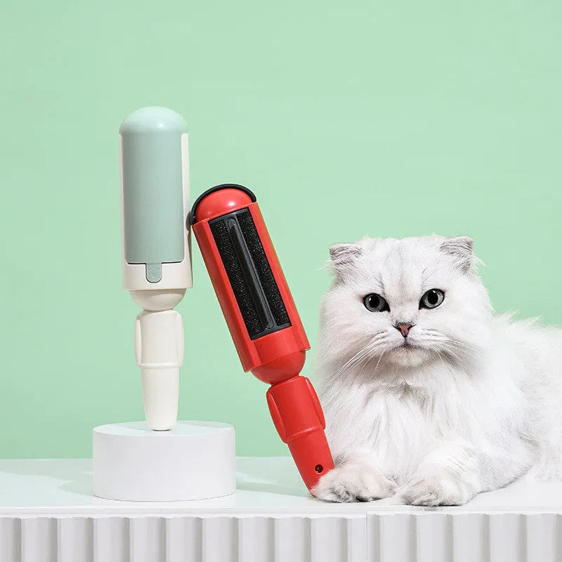 Pet hair remover roller with non-slip handle and self-cleaning base in red-black colour