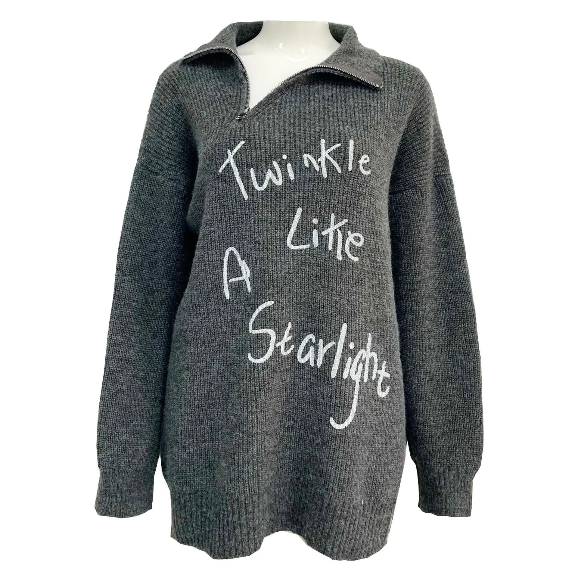 Light khaki women's alpaca wool pullover sweater with a diagonal front zipper and turtleneck.
