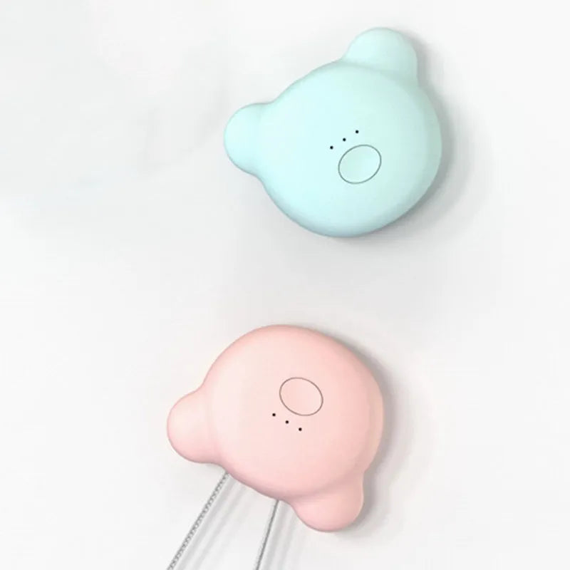 Mini USB portable air purifier necklace in blue colour, showing wearable design and single button.