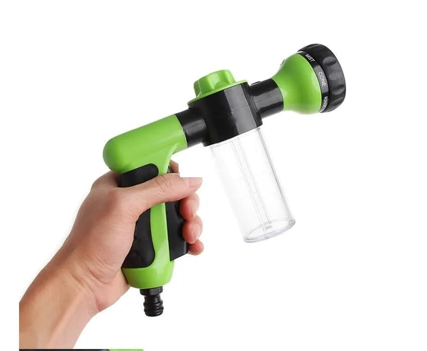 Green high-pressure foam spray gun with adjustable nozzle for car and household cleaning.