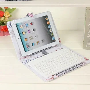 Wireless Bluetooth keyboard inside a protective case holster for a tablet or mobile phone.