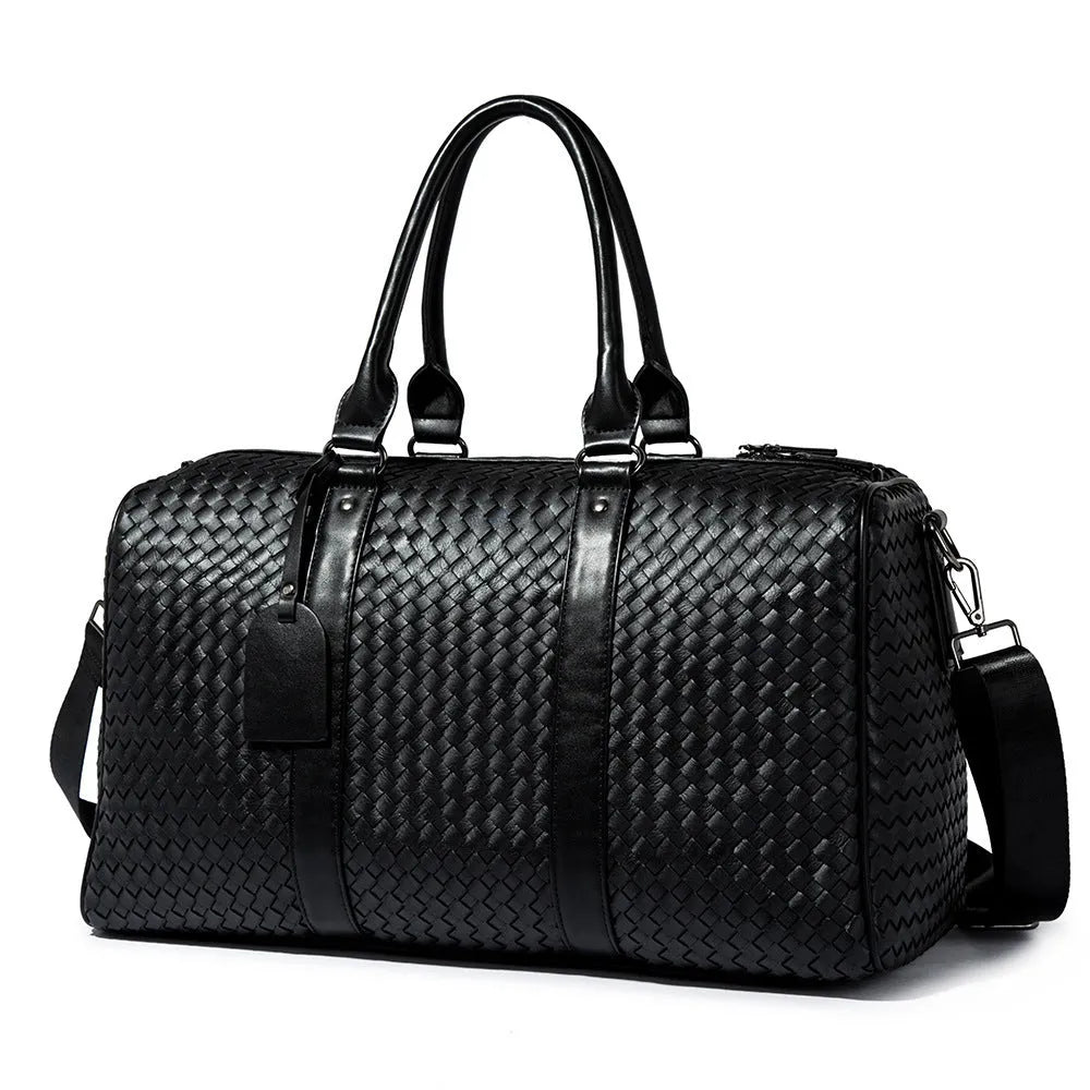 Black handwoven PU leather shoulder bag, medium size, zip closure, tie-rod fitting, on beige background