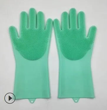 Silicone heat-resistant cleaning brush scrubbing gloves in blue, 357x165mm, on a kitchen counter