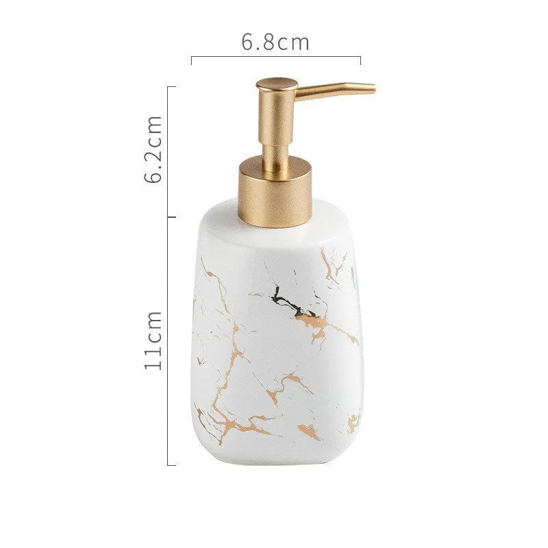 Ceramic bathroom wash set in white with decal finish, three pieces on countertop