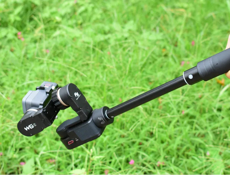 Black retractable selfie stick extended to show telescopic sections for phone photography.