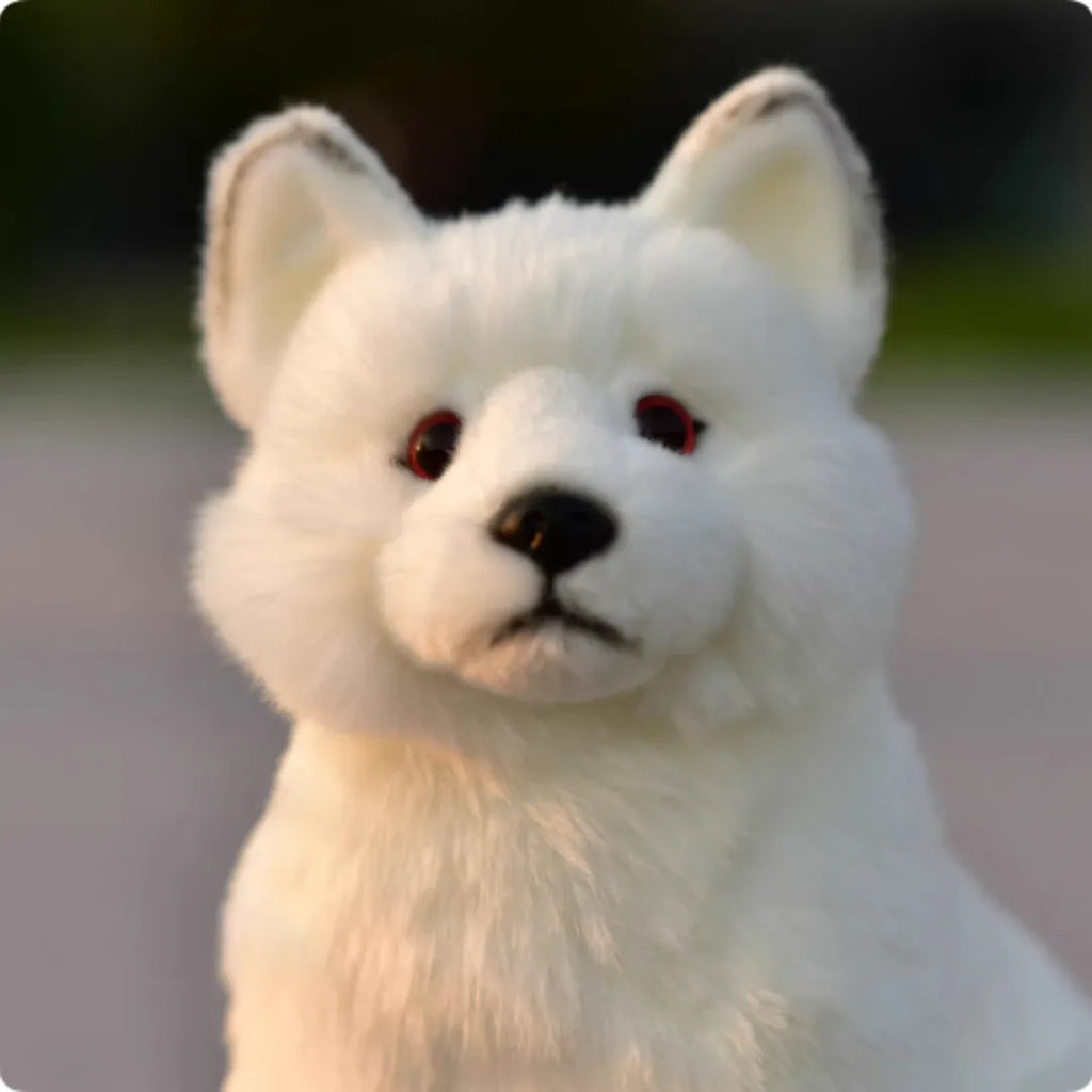 Soft plush toy animal doll approximately 25.5 cm tall in orange red colour, sitting firmly on a white desk surface