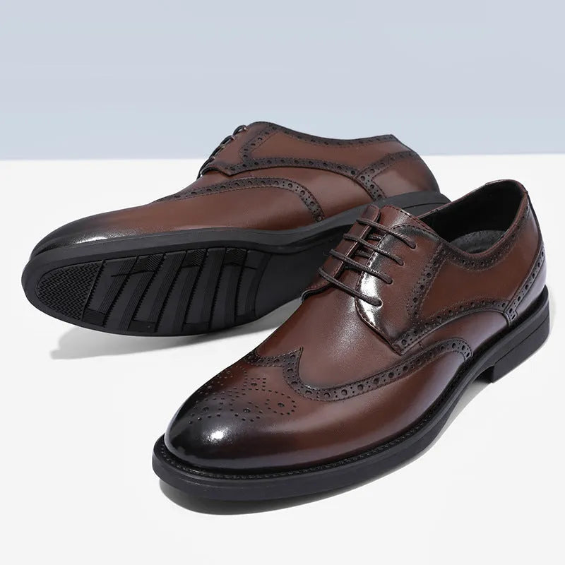 Men's black brogue leather shoes with traditional perforated toe design on business styling