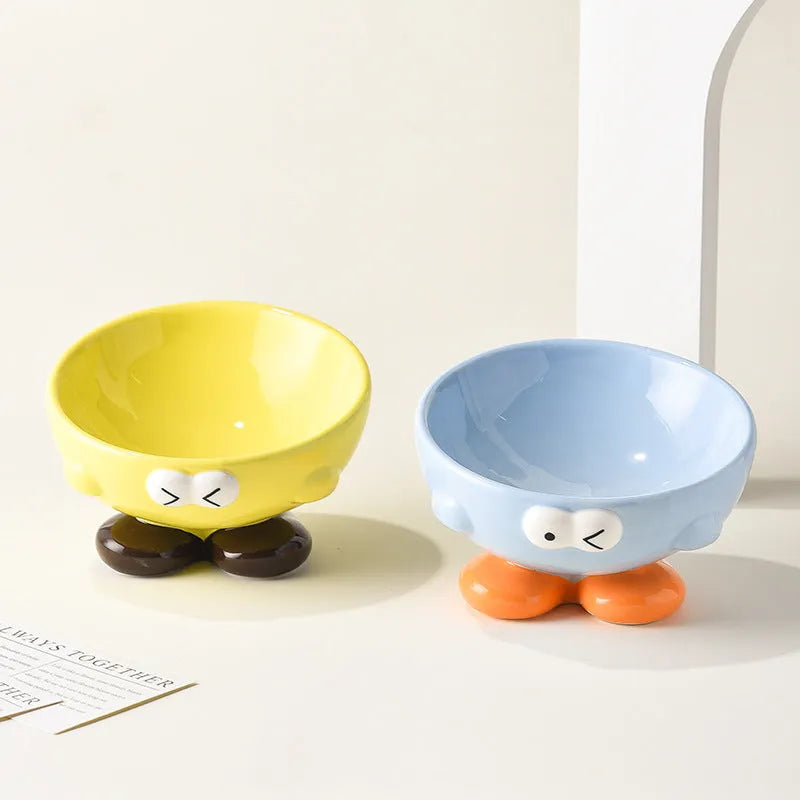 Oblique ceramic cat food bowl with cute expression print in blue for cervical spine protection