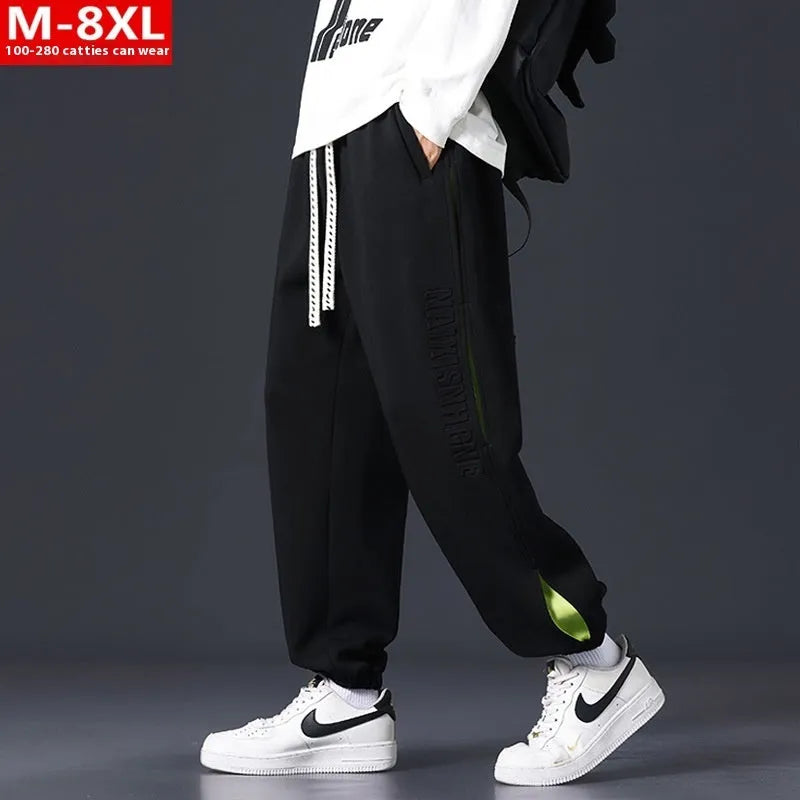 Men's cotton ankle banded pants with collage stitching printing in loose fit design