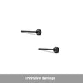 A pair of simple round flat S999 Sterling Silver ear bone studs for cartilage piercing.
