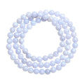 Blue agate multi-circle pattern bead bracelet with original design on a wrist