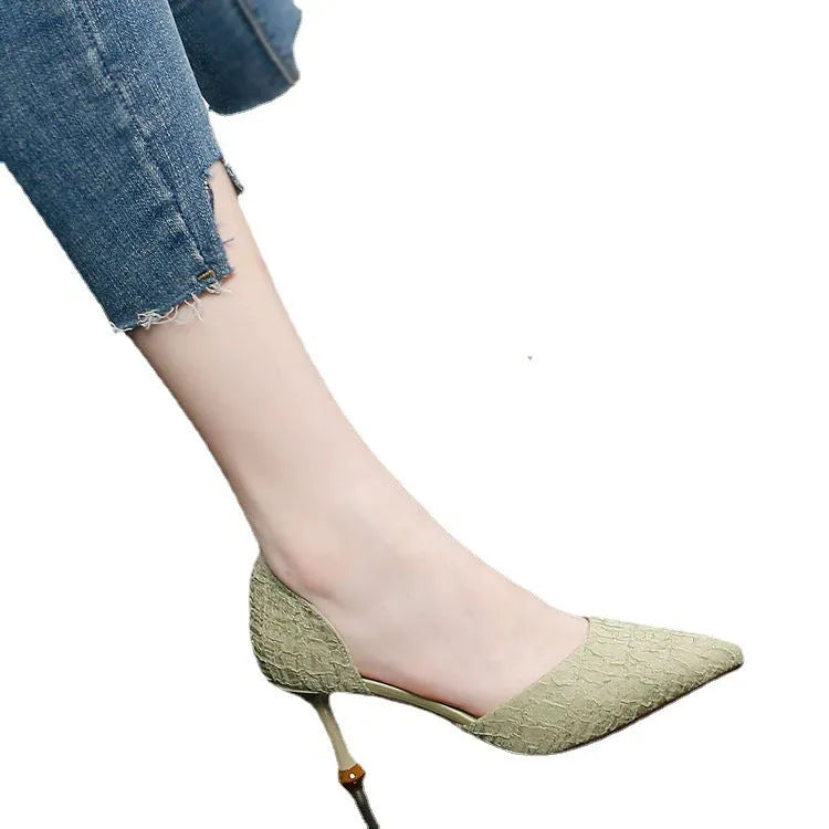 Black pointed toe stiletto high heel shoes with a PU upper and leather detail.