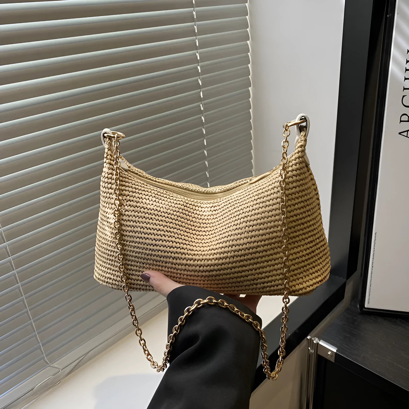 Vacation style straw woven beach shoulder tote bag in horizontal square shape with sandwich pocket