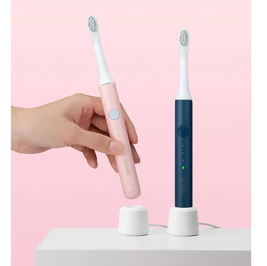 Sonic electric toothbrush with round brush head in blue, IPX7 waterproof handle with power button