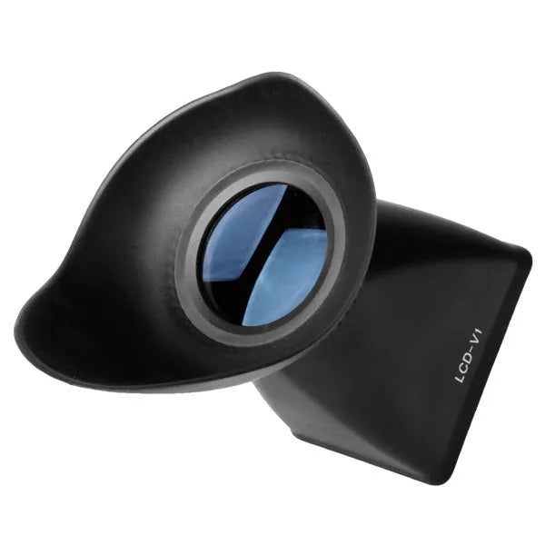 Black camera LCD viewfinder amplifier with magnification lens mounted on DSLR camera