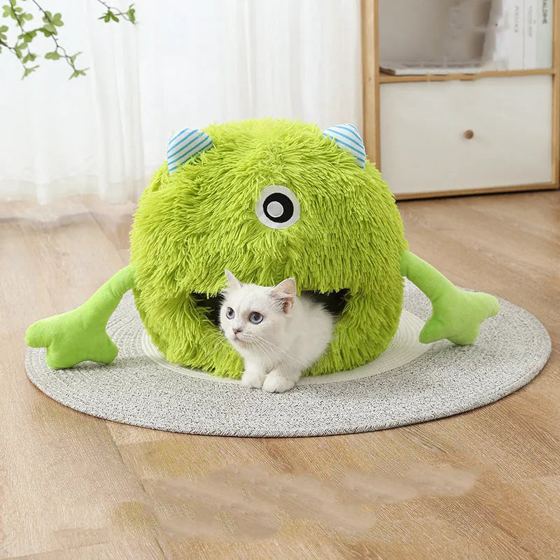 Round plush cat bed with non-slip base in three size options for indoor pets