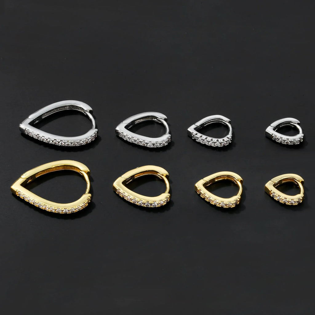 Copper geometric heart-shaped clip-on earring in a gold tone finish on a white background.