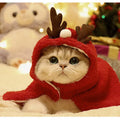 Red antlers hat cloak for dogs made of polar fleece, size M, on a small pet