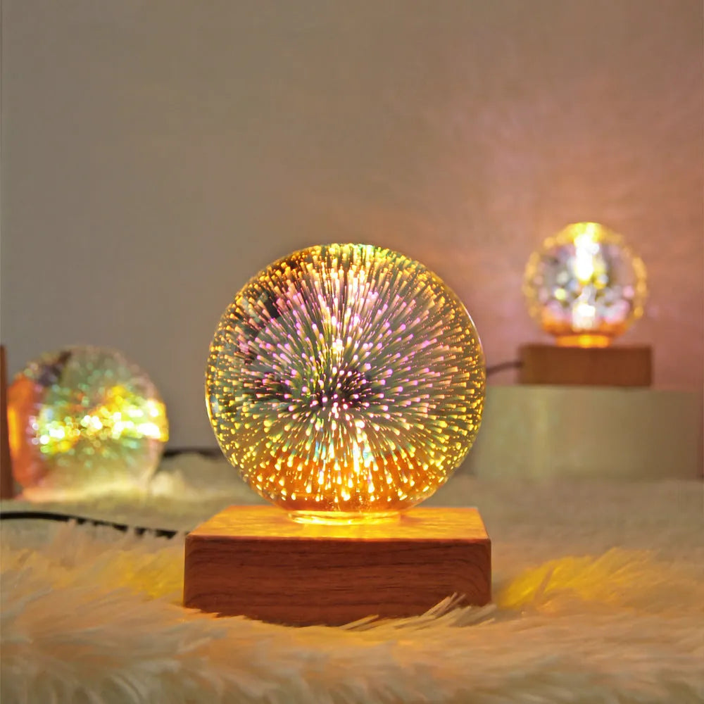 USB 3D firework crystal ball night light with warm LED, touch control, and starry sky effect on a wooden desk