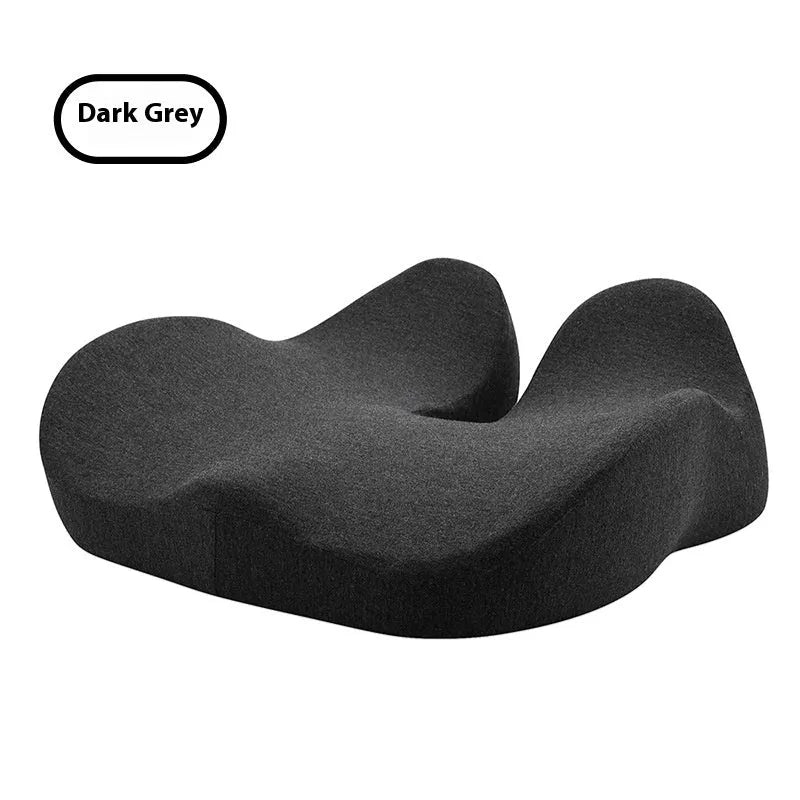 Light grey memory foam office chair cushion on a desk chair.