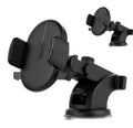 Black telescopic car dashboard phone holder with extended arm and gel suction cup mounted on a textured surface.