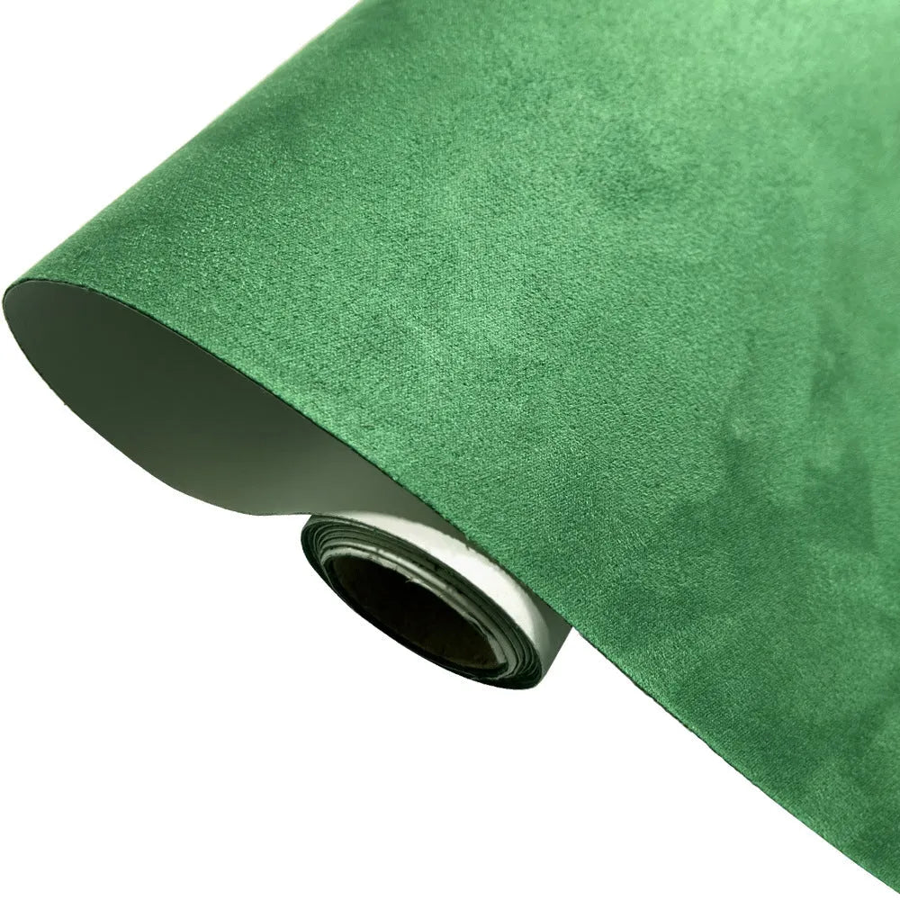 Roll of self-adhesive suede leather in a chosen colour, showing its texture and adhesive backing.