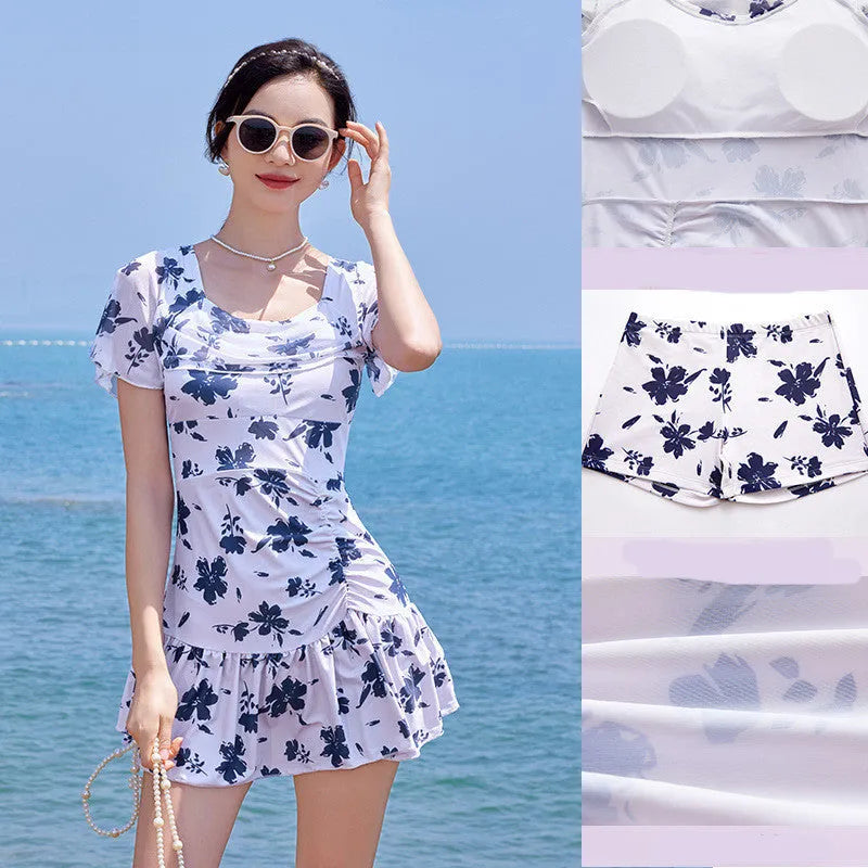 Women's mesh short sleeve swimming dress in Summer White with built-in briefs, one piece swimsuit