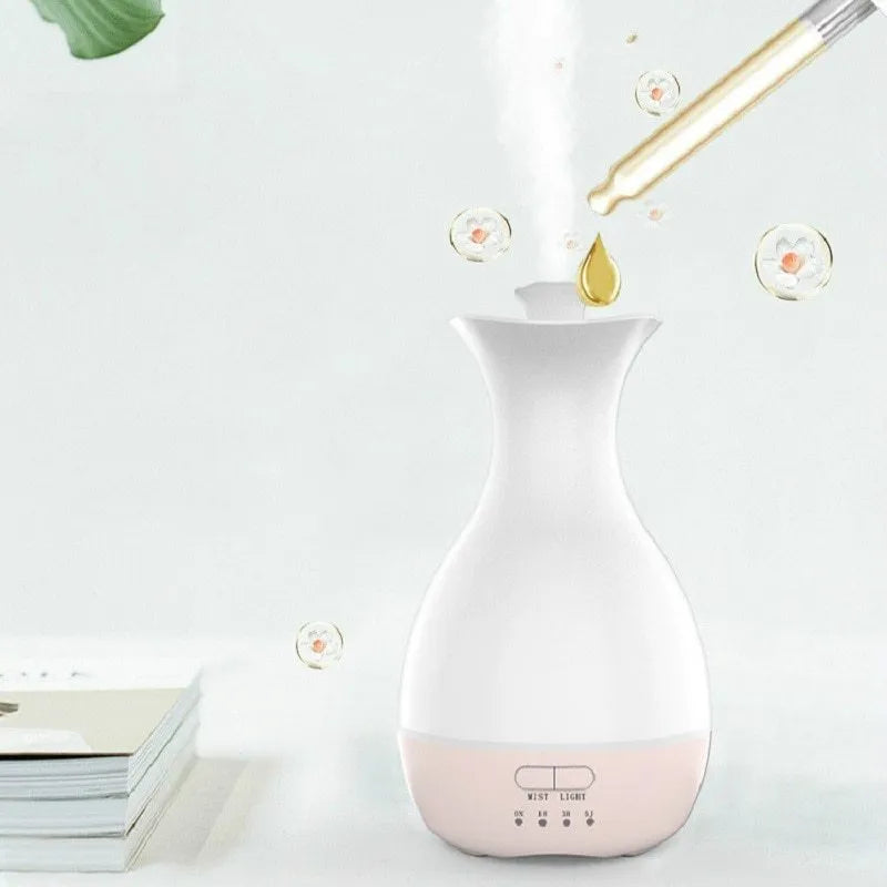 White ultrasonic aromatherapy vase diffuser with colourful LED night light and water tank