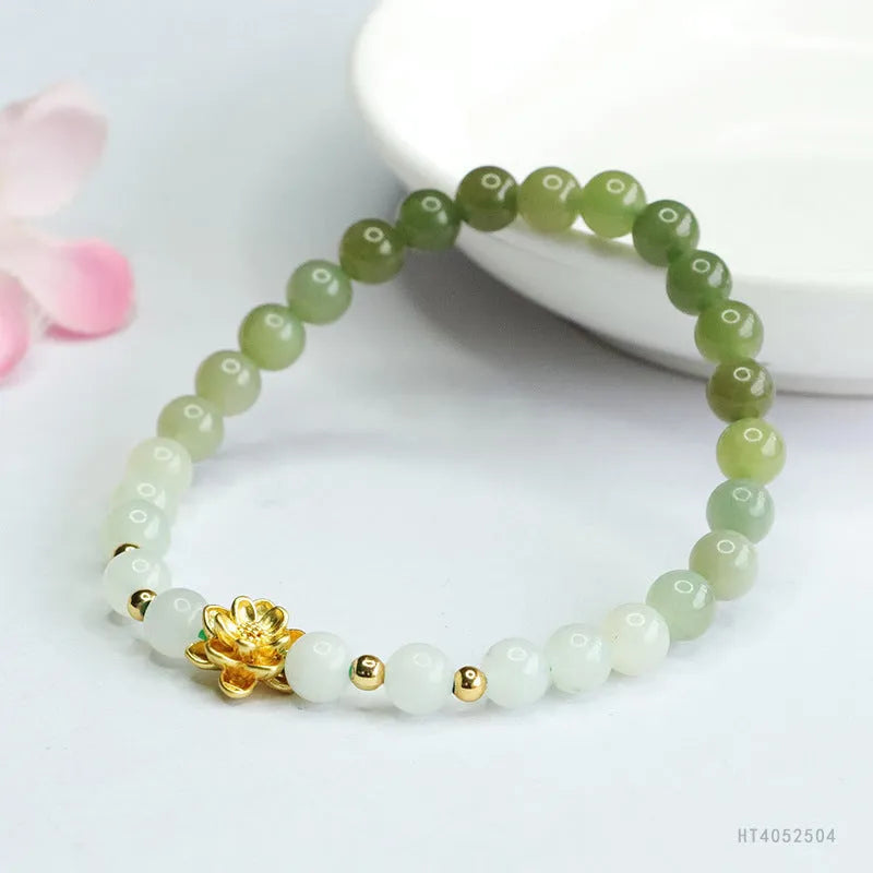 Hand-woven Hetian jade bracelet with a clear water gradient and national style floral design.