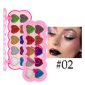 Pearlescent heart-shaped makeup palette open to show ten different coloured eyeshadows.