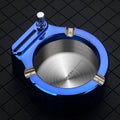 Large metal ashtray with permanent match lighter in blue, stainless steel and ABS construction, three cigarette slots