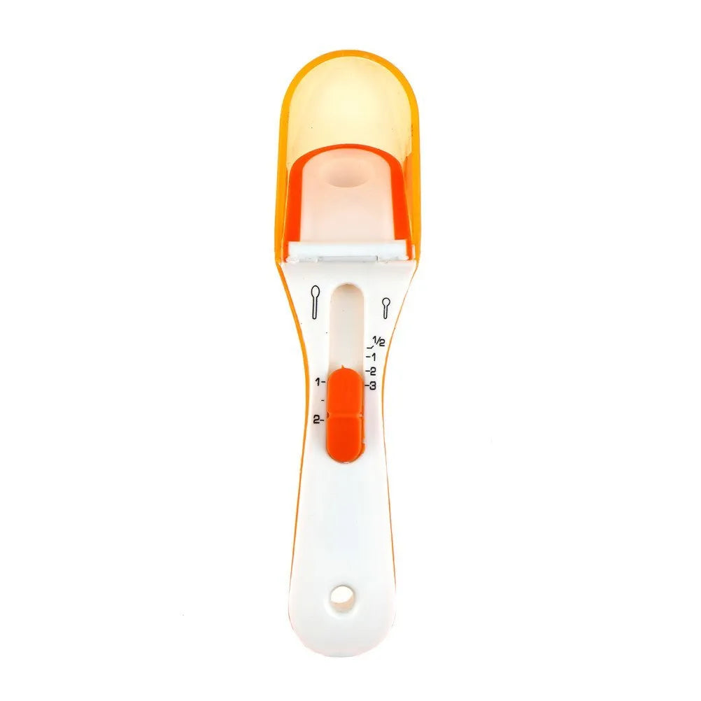 Orange and blue digital measuring spoons with magnetic snap showing nested storage on a fridge surface