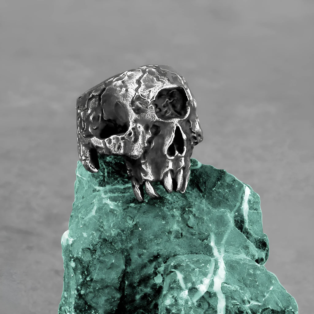 Alloy ring with one-eyed skull design showing electroplated metallic finish