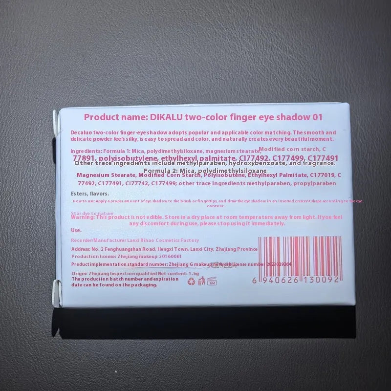 Cool two-tone eye shadow compact showing pink and black matte and shimmer shades for punk style makeup