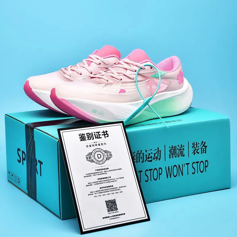 Low-top running trainers in multiple colours, showcasing the lace-up design and natural rubber sole.