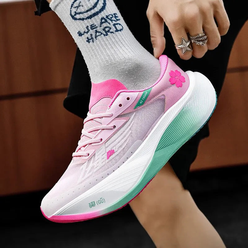 Low-top running trainers in multiple colours, showcasing the lace-up design and natural rubber sole.