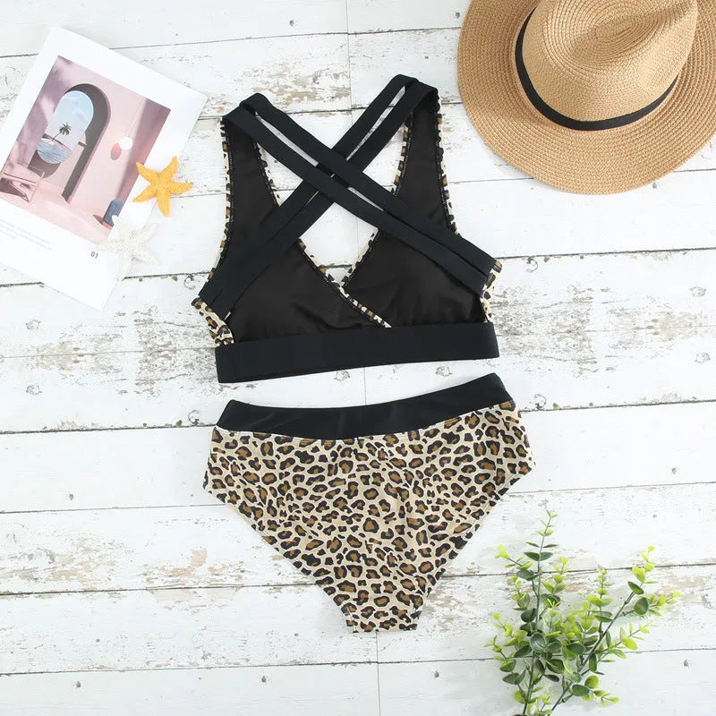 Women's leopard print V-neck swimsuit with cross banded bikini design and floral patterned briefs